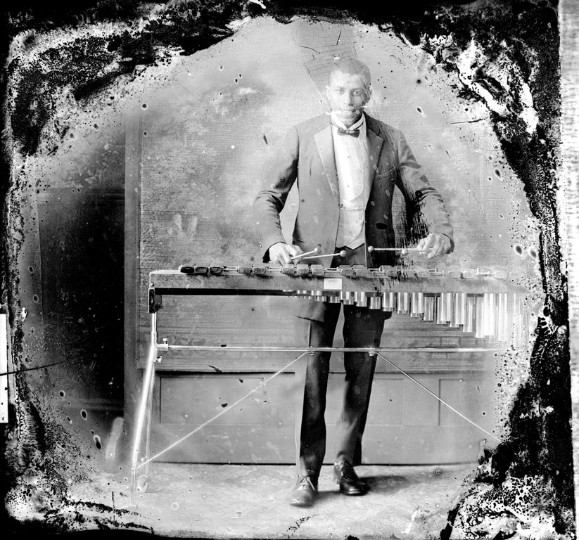 Photo of man playing xylophone 