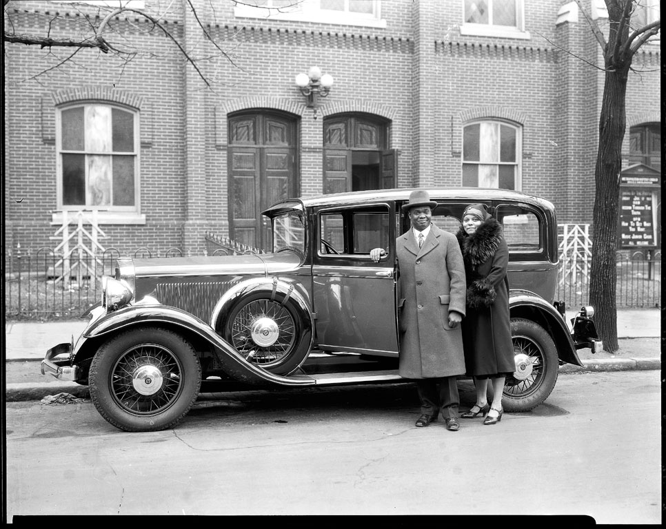 Photo of Dr. and Mrs. E.C. Smith w/ car, ca. 1940s.