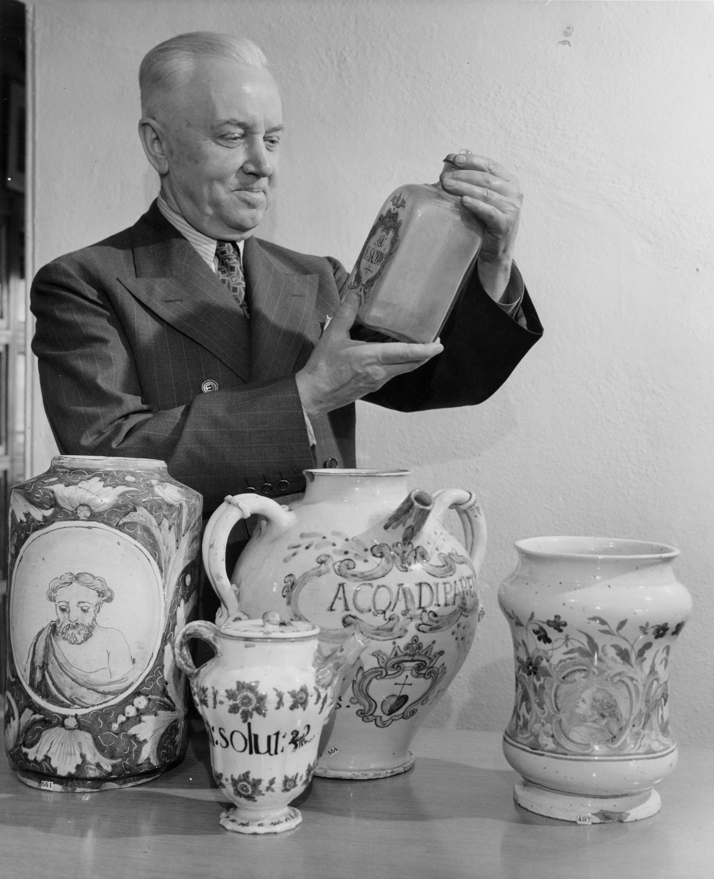 Charles Whitebread Examines Jars from the Squibb Collection