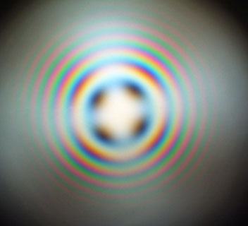 An image of Newton's ring, interference pattern of concentric light and dark rings