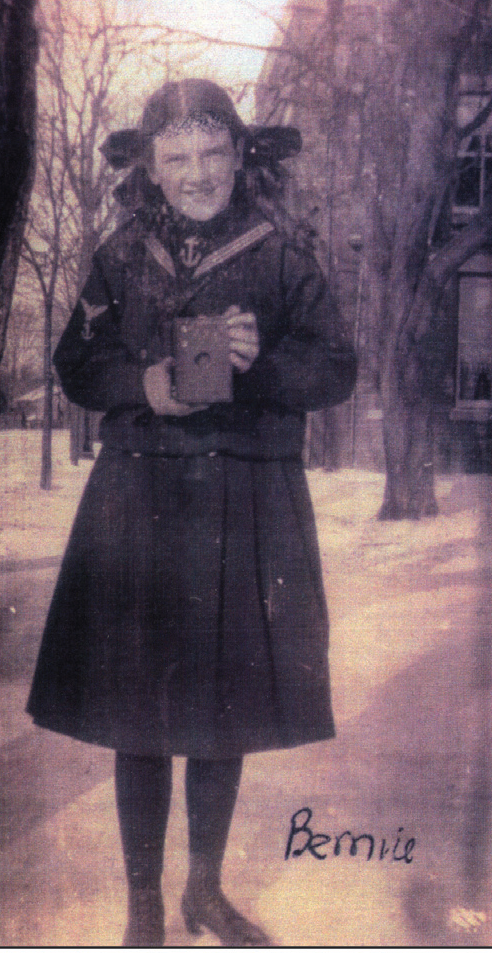 Photograph of Bernice Palmer holding her Kodak Bernie Camera