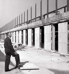 Frank Taylor monitors construction on the building’s fifth floor terrace