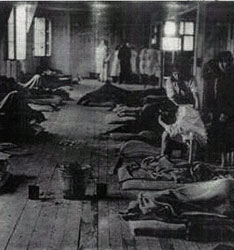 Prisoners on thin mattresses on the barracks floor in the women’s camp of the Theresienstadt ghetto in Czechoslovakia, between 1941 and 1945