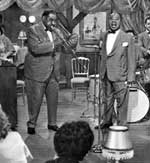 Louis Armstrong performing